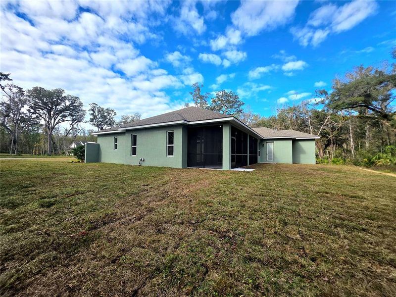 Exterior details and patio area of a home in , Brooksville (Image 30).