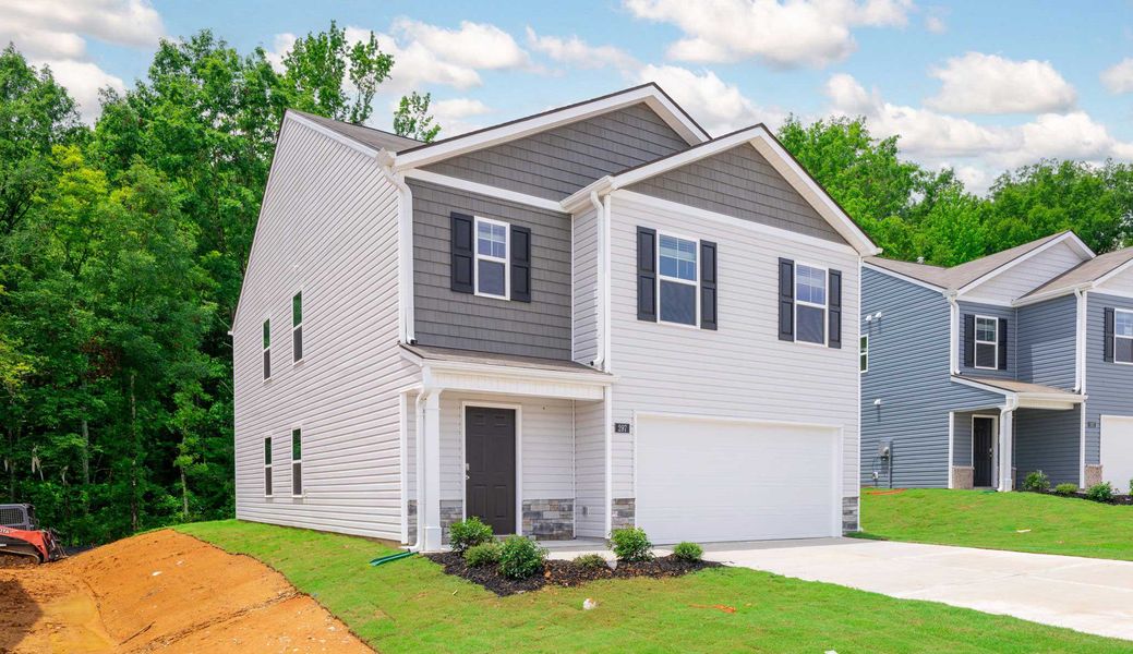 Front exterior of a new home in Hawk's Ridge, Rossville, GA, highlighting curb appeal (Image 2).