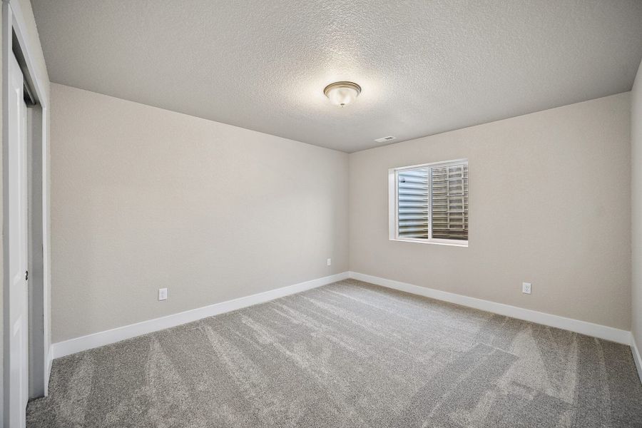 Spacious, unfurnished interior of a new home in The Glen-12, Colorado Springs (Image 44).