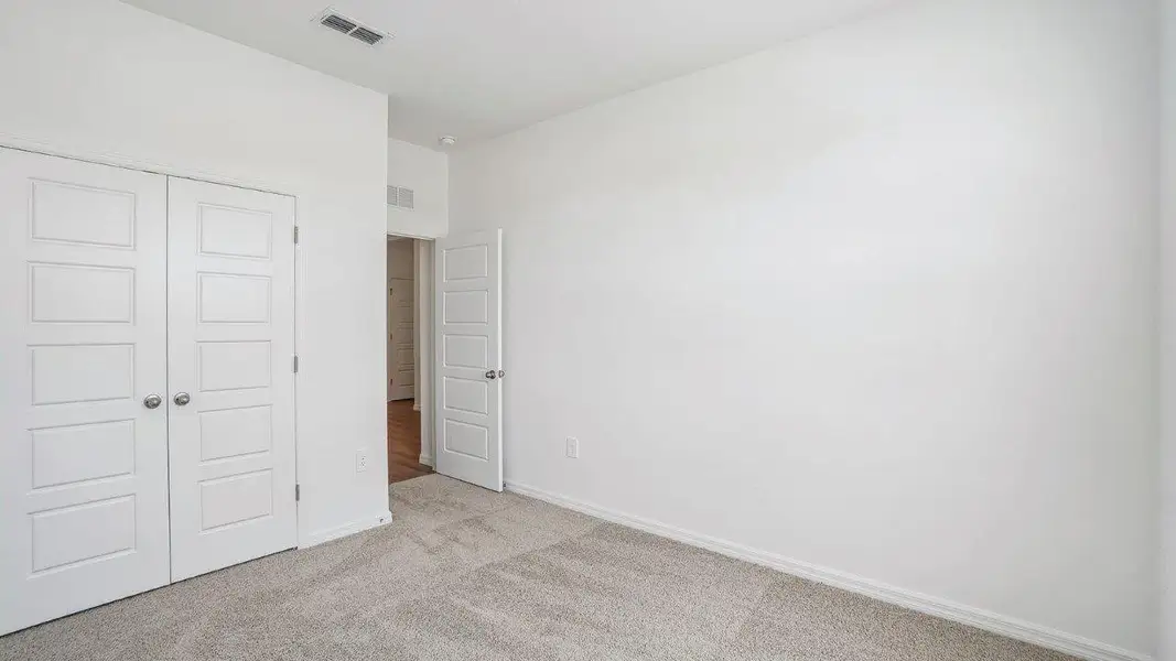 Spacious, unfurnished interior of a new home in Harmony at Lake Eloise, Winter Haven (Image 26).