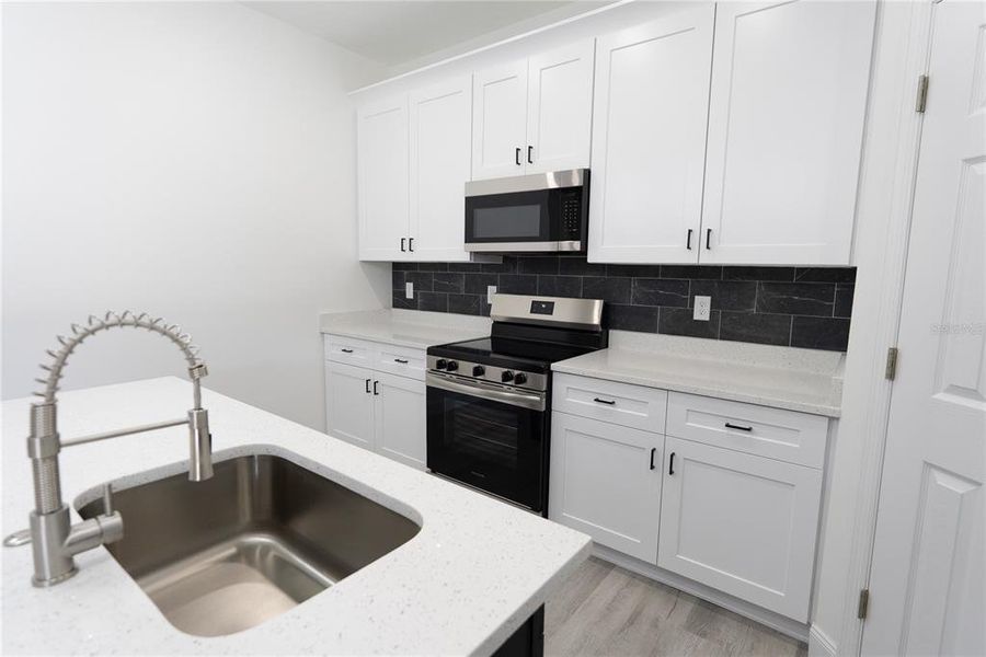 Furnished interior view inside a new home in , Apopka (Image 10).