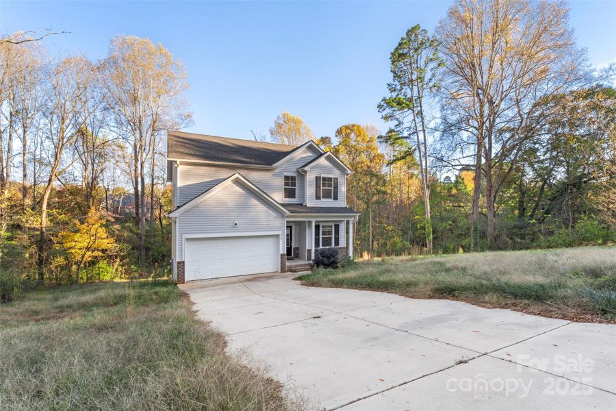 Front exterior of a new home in , Salisbury, NC, highlighting curb appeal (Image 27).