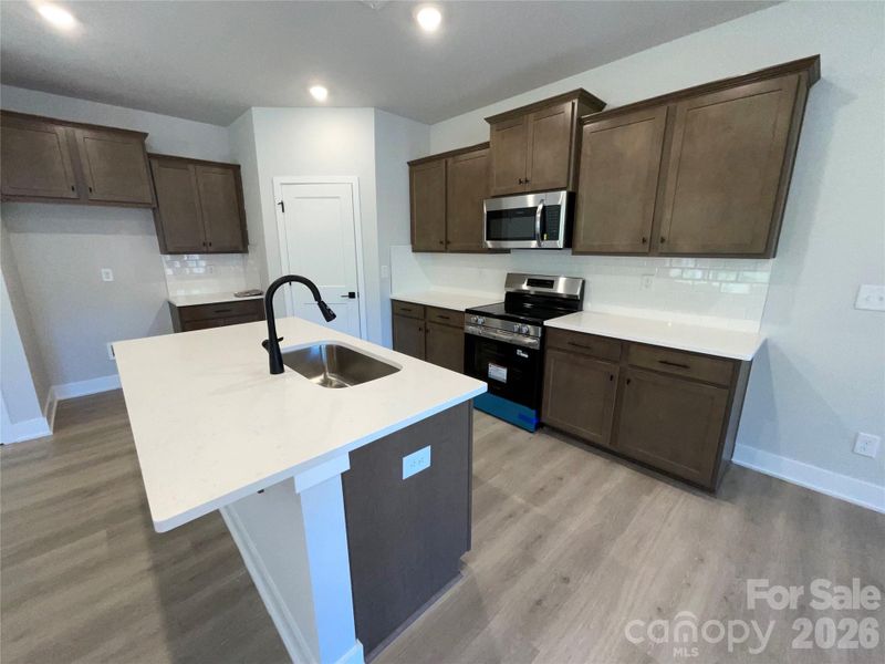 Furnished interior view inside a new home in Pine Trace, Gastonia (Image 5).
