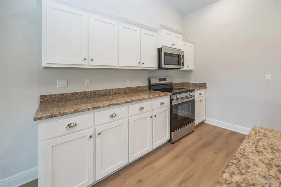 Furnished interior view inside a new home in Cedar Creek at Deerpoint Lake, Panama City (Image 3).
