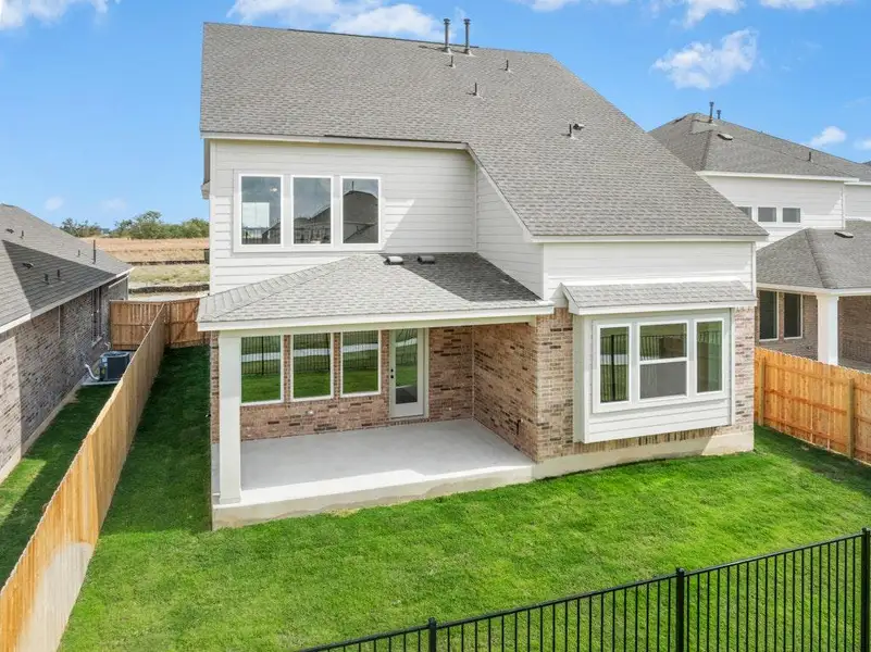 Exterior details and patio area of a home in University Heights, Round Rock (Image 3). Exterior details and patio area of a home in University Heights, Round Rock (Image 3).