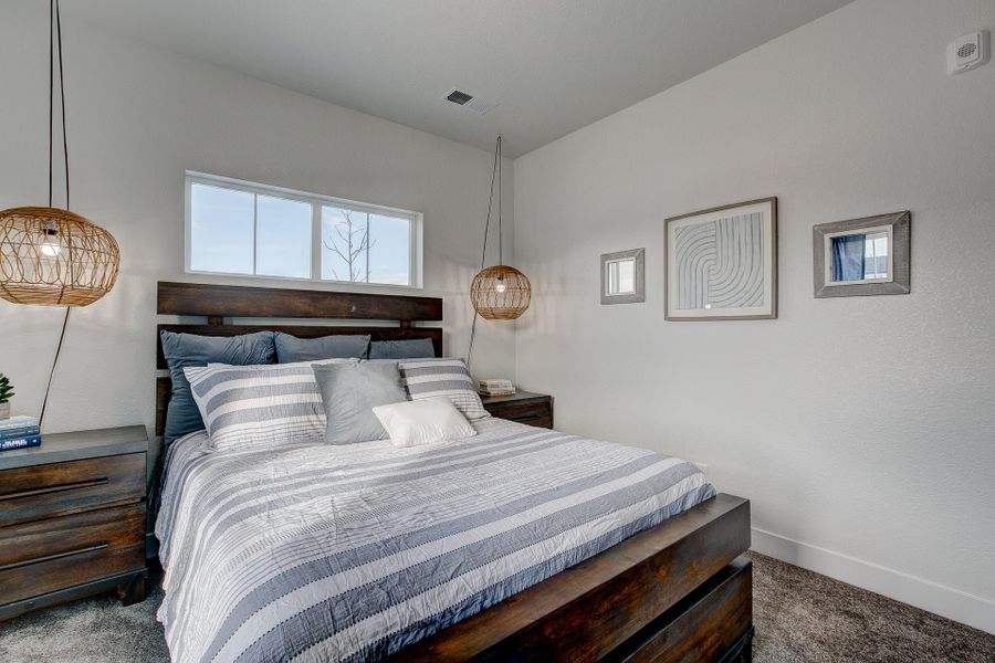 Representative furnished interior of a home built from the The Cambridge by Landmark Homes in The Lakes at Centerra, Loveland (Image 31).