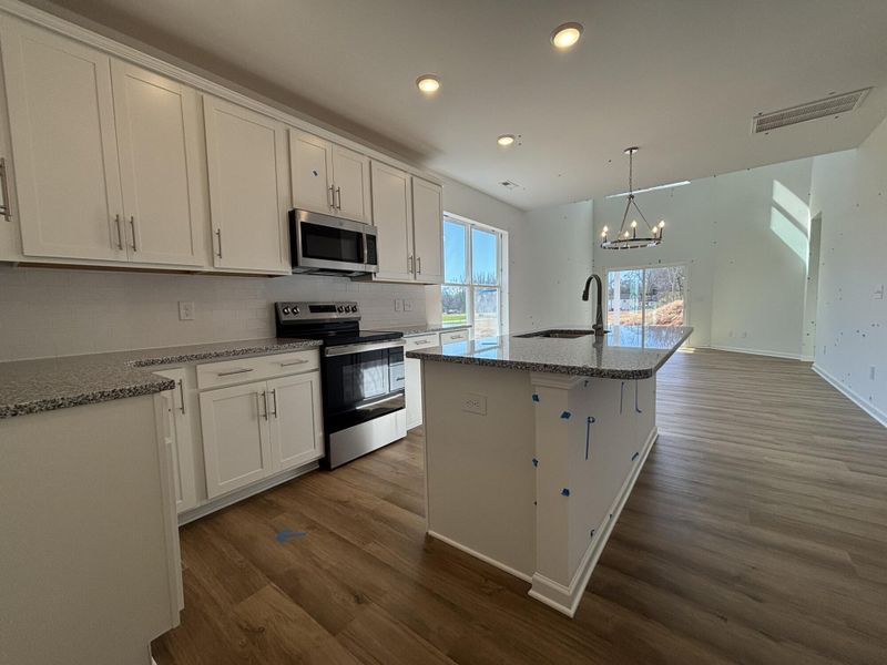 Furnished interior view inside a new home in CraigStone, Woodruff (Image 4). Furnished interior view inside a new home in CraigStone, Woodruff (Image 4).