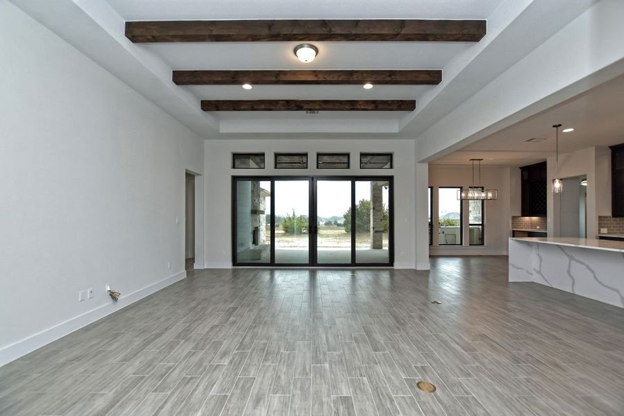 Representative unfurnished interior of a home built from the Avalon by Giddens Homes in Scofield Farms Estates, Georgetown (Image 20).