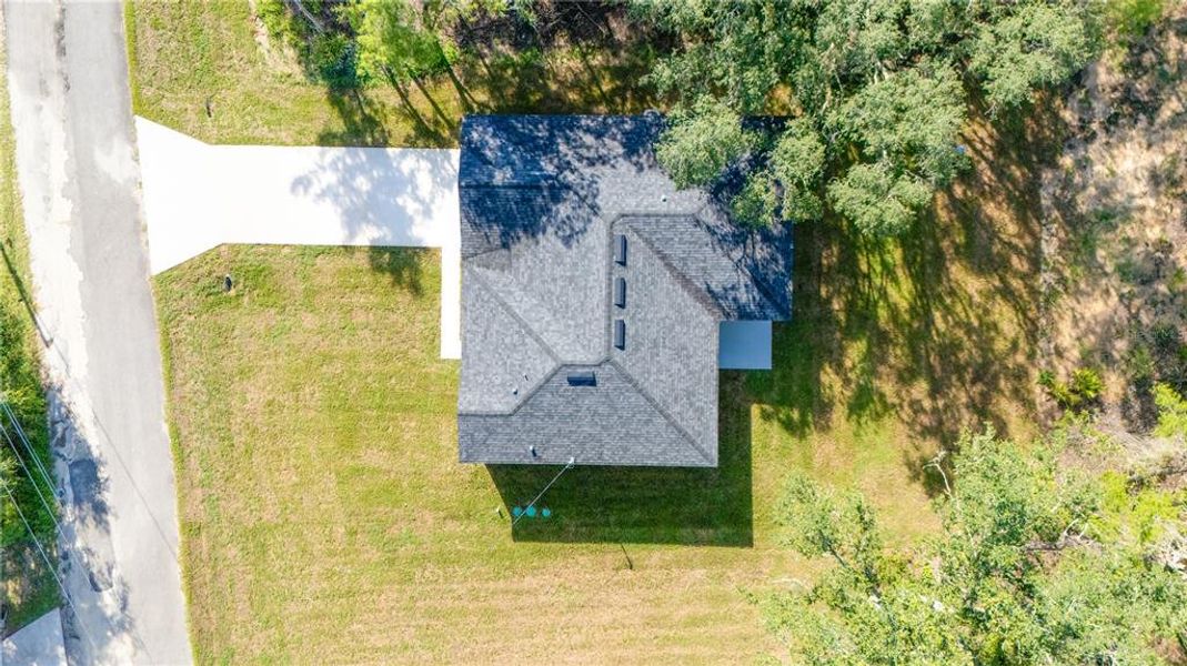 Front exterior of a new home in , Ocklawaha, FL, highlighting curb appeal (Image 2).
