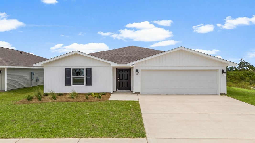 Front exterior of a new home in Liberty, Panama City, FL, highlighting curb appeal (Image 1). Front exterior of a new home in Liberty, Panama City, FL, highlighting curb appeal (Image 1).