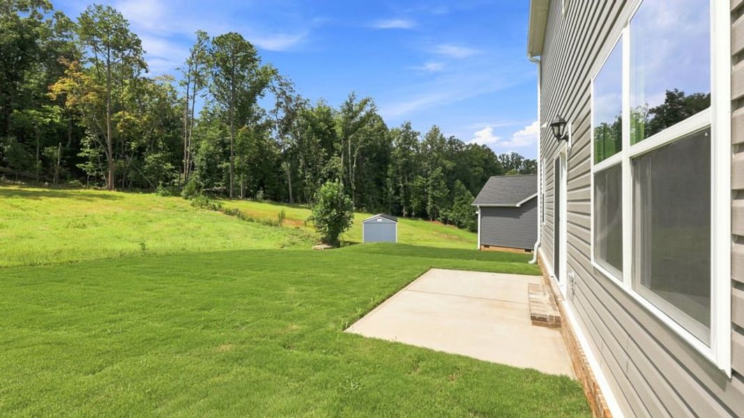 Exterior details and patio area of a home in Pine Lake Estates, Anderson (Image 3).
