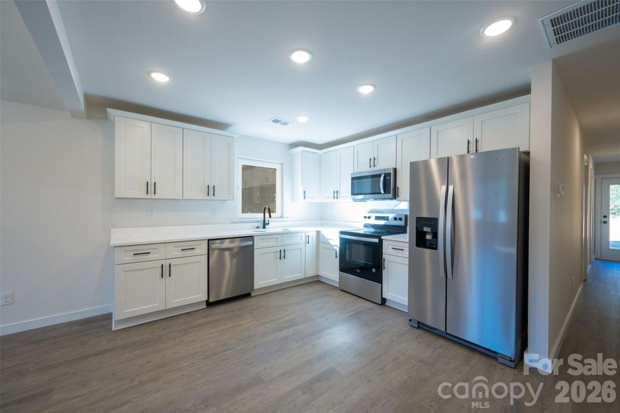 Furnished interior view inside a new home in , Statesville (Image 11).
