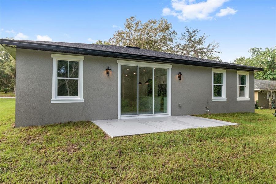 Exterior details and patio area of a home in , Ocala (Image 3).