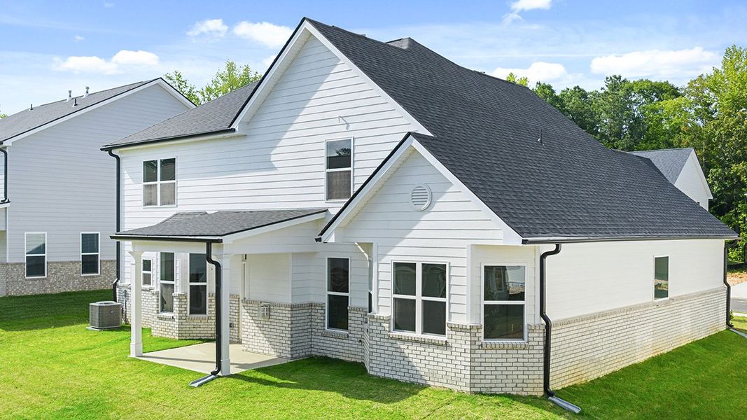 Front exterior of a new home in Wildwood, Covington, GA, highlighting curb appeal (Image 25). Front exterior of a new home in Wildwood, Covington, GA, highlighting curb appeal (Image 25).