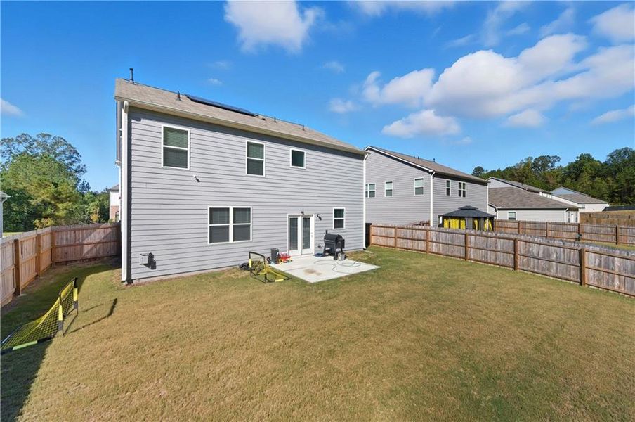 Exterior details and patio area of a home in Oakhurst Glen, Fairburn (Image 27). Exterior details and patio area of a home in Oakhurst Glen, Fairburn (Image 27).