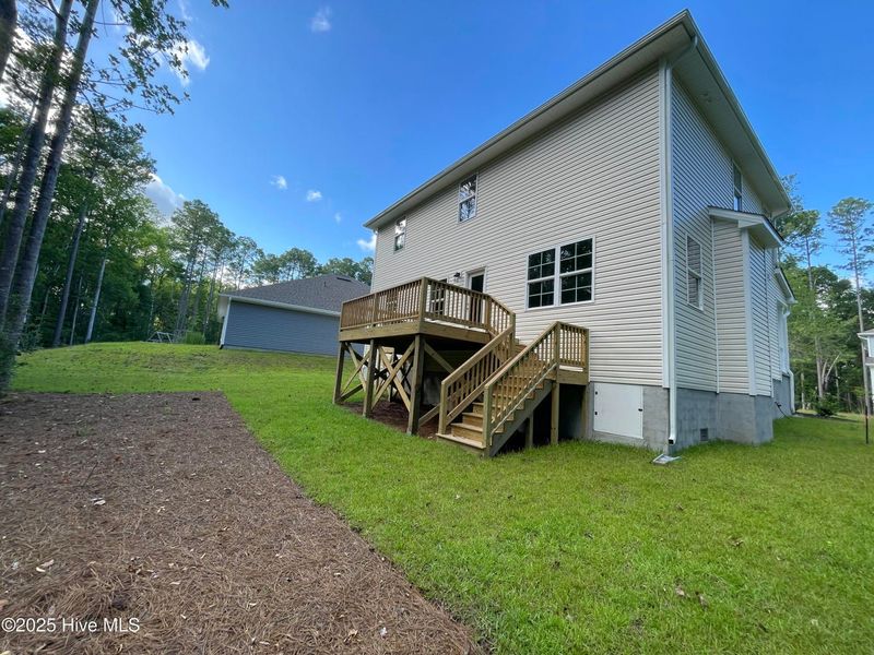 Front exterior of a new home in Mill Creek Cove, Bolivia, NC, highlighting curb appeal (Image 17).