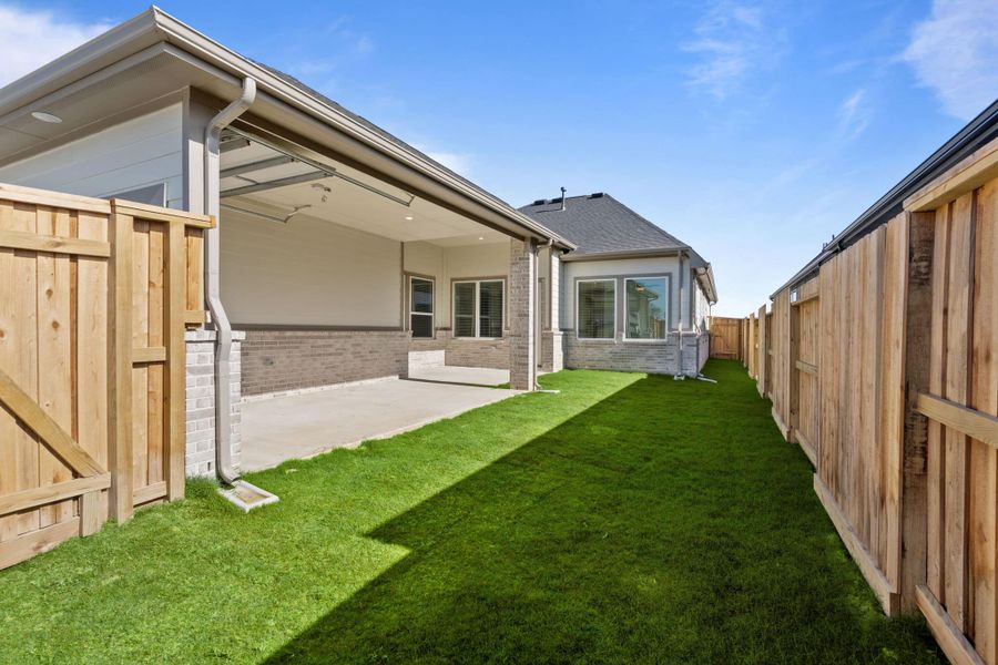 Exterior details and patio area of a home in Riceland, Mont Belvieu (Image 4). Exterior details and patio area of a home in Riceland, Mont Belvieu (Image 4).