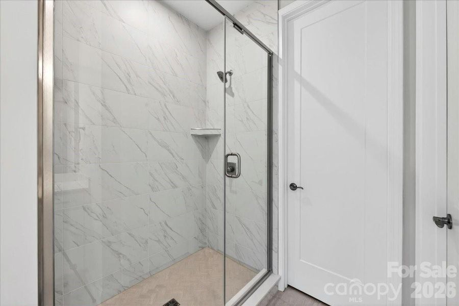 Tiled primary walk-in shower Tiled primary walk-in shower