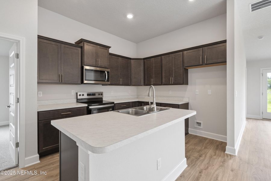 Furnished interior view inside a new home in Summerglen, Jacksonville (Image 6). Furnished interior view inside a new home in Summerglen, Jacksonville (Image 6).