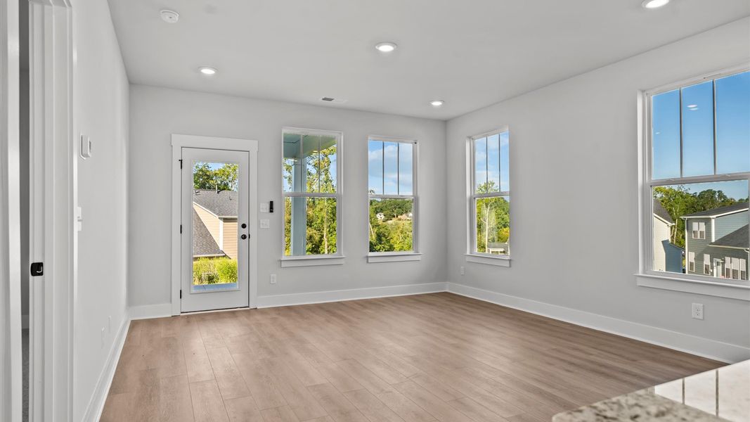 Superior design shines in this open-concept family room with timeless finishes and a modern edge