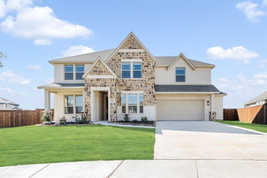 Front exterior of a new home in Somerset Classic 70s & 80s, Mansfield, TX, highlighting curb appeal (Image 22). Front exterior of a new home in Somerset Classic 70s & 80s, Mansfield, TX, highlighting curb appeal (Image 22).