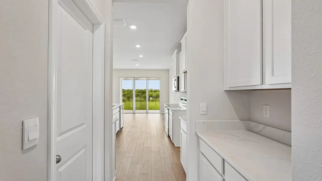 Furnished interior view inside a new home in Seaire, Parrish (Image 4).