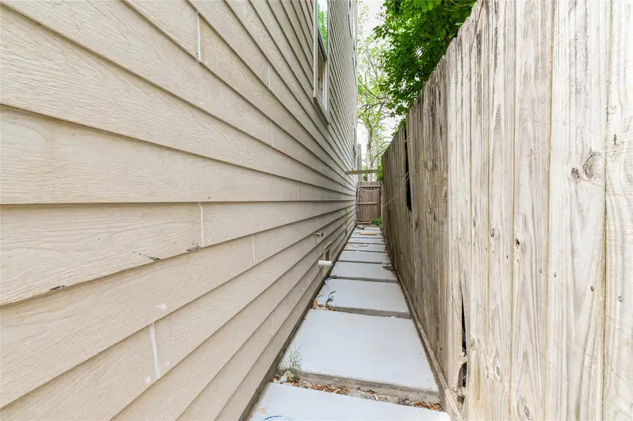 Exterior details and patio area of a home in , Houston (Image 7).