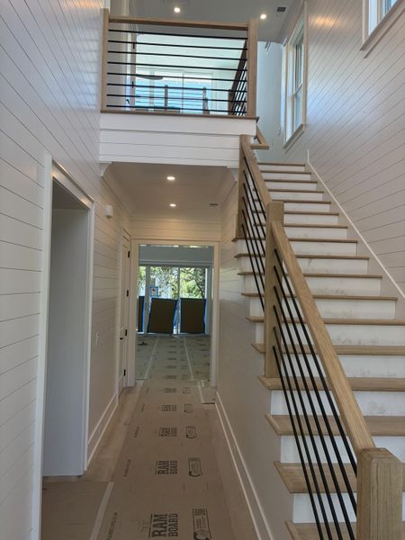 Spacious, unfurnished interior of a new home in , Isle Of Palms (Image 5). Spacious, unfurnished interior of a new home in , Isle Of Palms (Image 5).