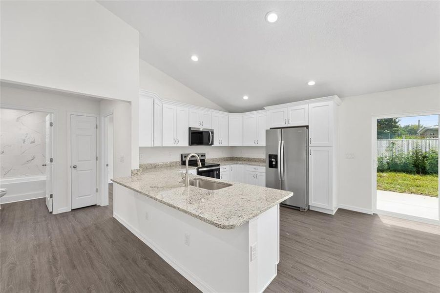 Furnished interior view inside a new home in , Dunnellon (Image 7).