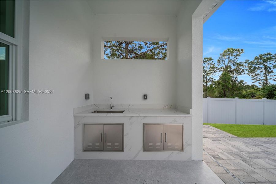 Exterior details and patio area of a home in , Lehigh Acres (Image 3). Exterior details and patio area of a home in , Lehigh Acres (Image 3).