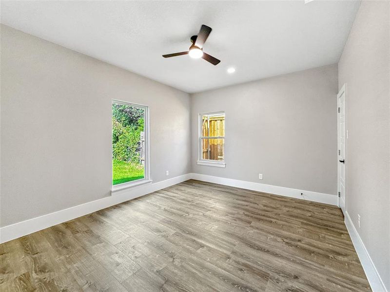 Unfurnished room with wood finished floors, recessed lighting, and ceiling fan