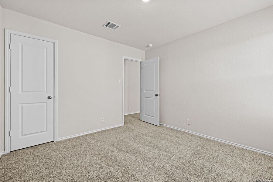Spacious, unfurnished interior of a new home in Redbird Ranch, San Antonio (Image 12).