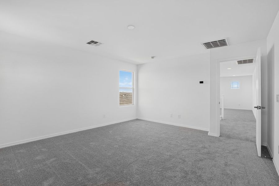 Spacious, unfurnished interior of a new home in Artisan at Asante, Surprise (Image 17).