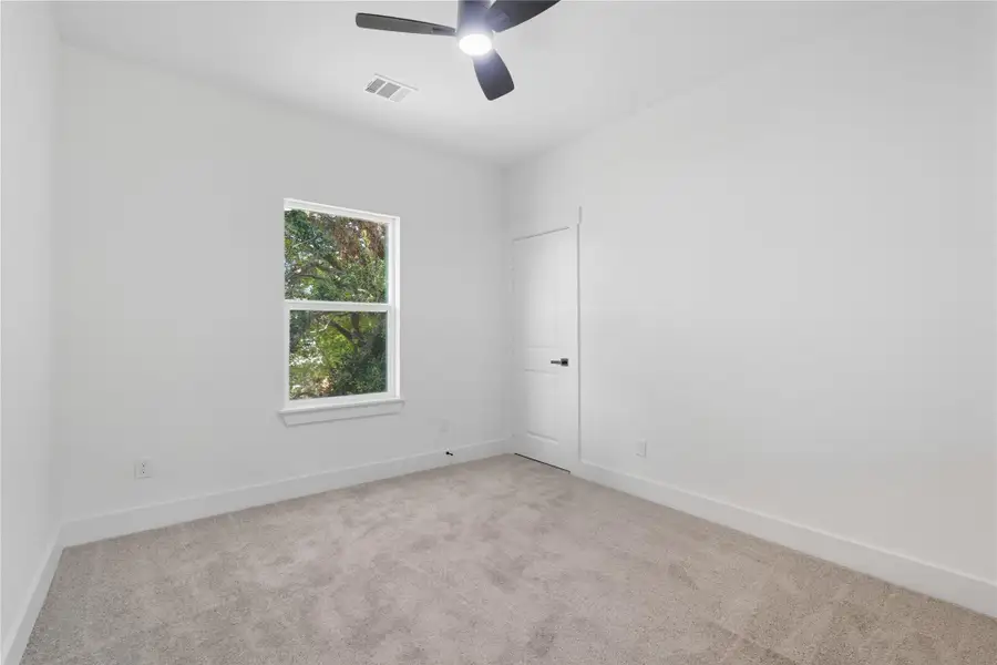 Bedroom two offers a bright and versatile space, complete with brand new carpeting of course and a large window that brings in natural light. It’s a cozy and flexible space ready to fit your lifestyle!