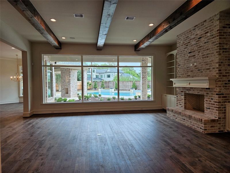 Photo Update April 2026 - Family room with pool views