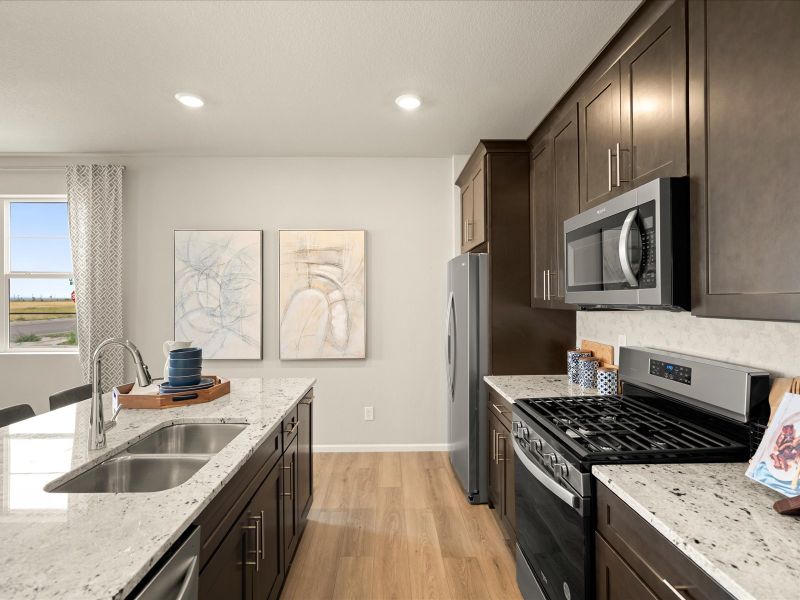 Furnished interior view inside a new home in Skyview at High Point, Aurora (Image 9).