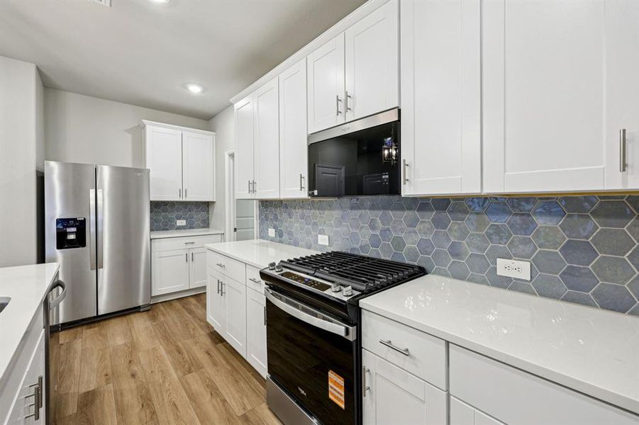 Furnished interior view inside a new home in Parks at Foster Crossing - Spring Series, Anna (Image 14).