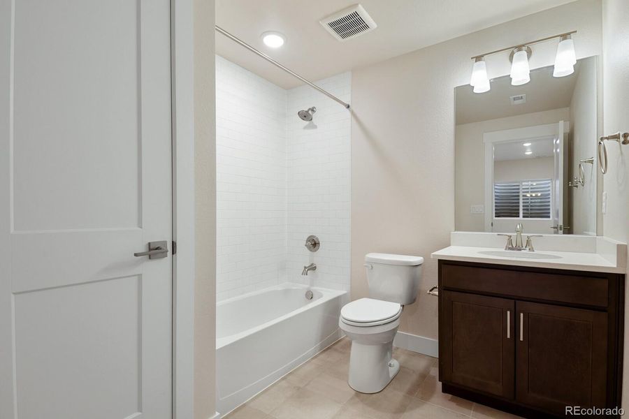 Full bath with linen closet