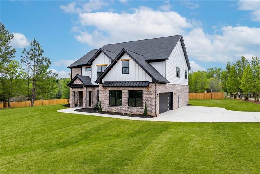 Front exterior of a new home in , Pendergrass, GA, highlighting curb appeal (Image 21).