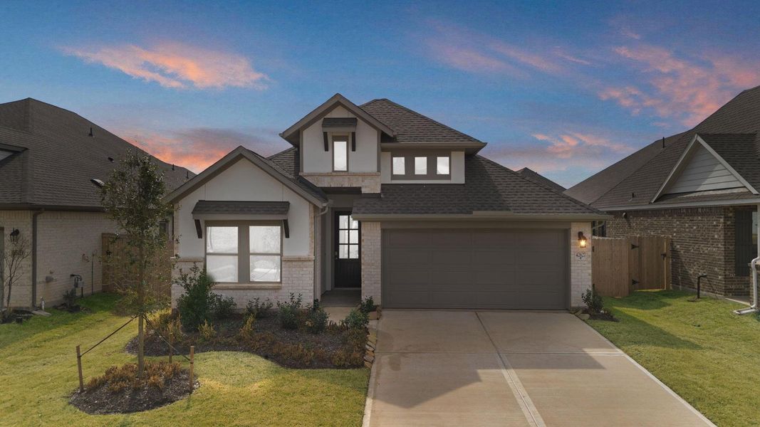 Front exterior of a new home in Escondido, Magnolia, TX, highlighting curb appeal (Image 22).