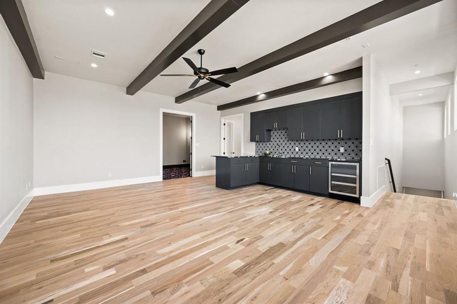 Spacious Gameroom with built-in wine cooler and wet bar