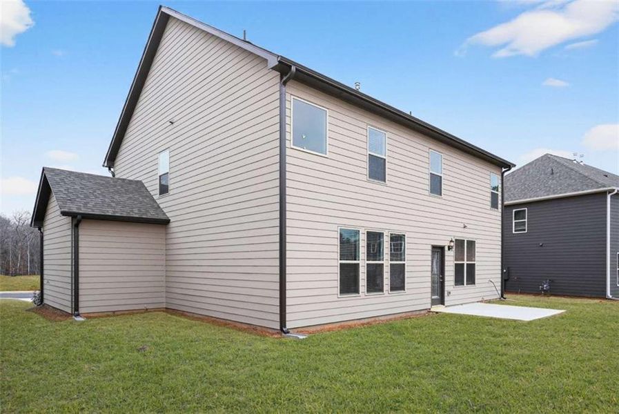 Exterior details and patio area of a home in The Fairways at Mirror Lake, Villa Rica (Image 4).