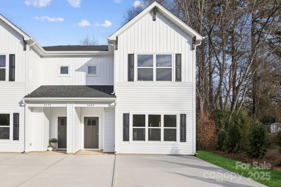 Front exterior of a new home in , Charlotte, NC, highlighting curb appeal (Image 1). Front exterior of a new home in , Charlotte, NC, highlighting curb appeal (Image 1).