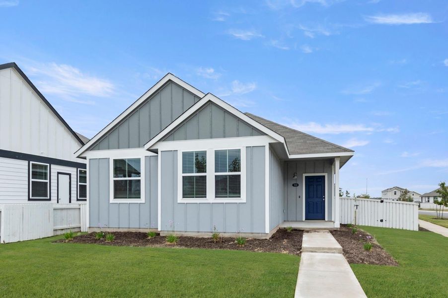 Front exterior of a new home in Casetta Ranch, Kyle, TX, highlighting curb appeal (Image 17).