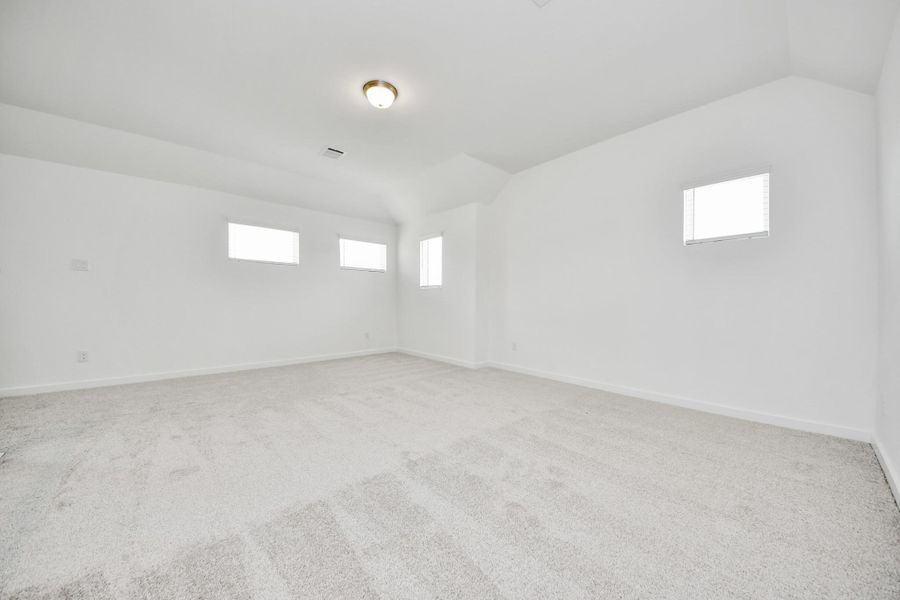 Ascend to relaxation in this fantastic game room! Ideal for both casual gatherings and adult gaming, it boasts plush carpet, lofty ceilings, custom paint, and ample windows for abundant natural light. Ascend to relaxation in this fantastic game room! Ideal for both casual gatherings and adult gaming, it boasts plush carpet, lofty ceilings, custom paint, and ample windows for abundant natural light.