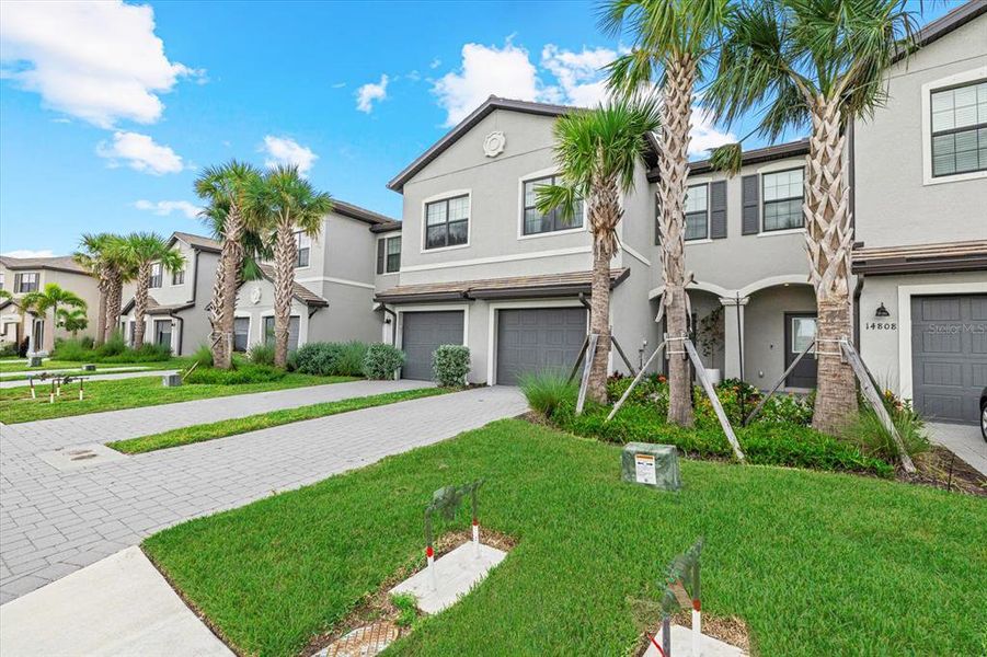 Front exterior of a new home in , Lakewood Ranch, FL, highlighting curb appeal (Image 2).