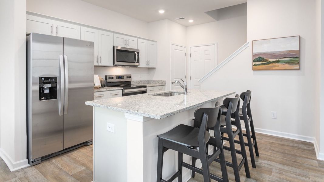 Furnished interior view inside a new home in North Village Townes, Greensboro (Image 9).
