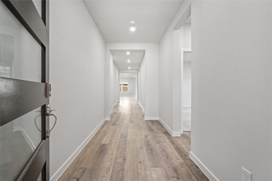 Spacious, unfurnished interior of a new home in Sunterra, Katy (Image 16).