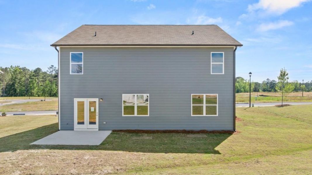 Exterior details and patio area of a home in Fairway 17 at Mirror Lake, Villa Rica (Image 3).
