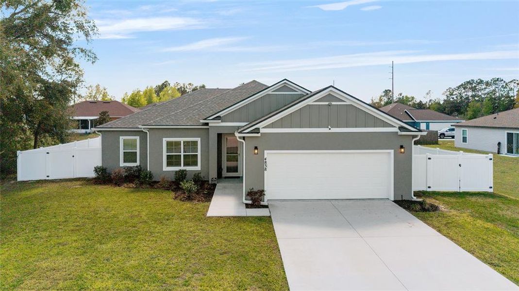 Front exterior of a new home in , Ocala, FL, highlighting curb appeal (Image 24). Front exterior of a new home in , Ocala, FL, highlighting curb appeal (Image 24).